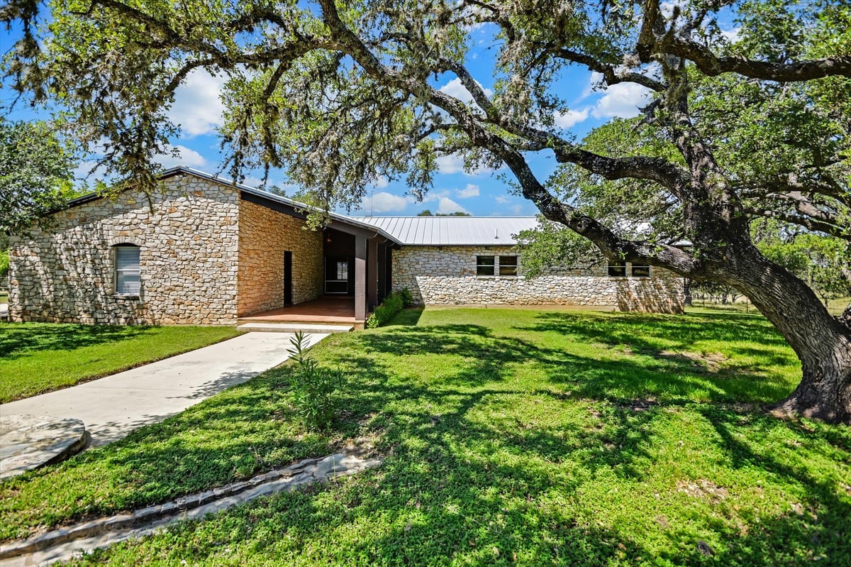 View 3900 FM 2325 in JOHN INGRAM SURVEY 3900 FM 2325 - property photo 1 - Luxury home in JOHN INGRAM SURVEY, Wimberley, TX