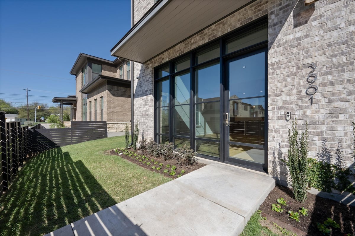 3901 Sightline St Unit #119 - front exterior - Luxury home in Grove Master Condos, Austin, TX