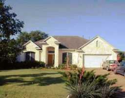 View 3916 Sendero Dr in TRAVIS COUNTRY @ GAINES 3916 Sendero Dr - front exterior - Luxury home in TRAVIS COUNTRY @ GAINES, Austin, TX