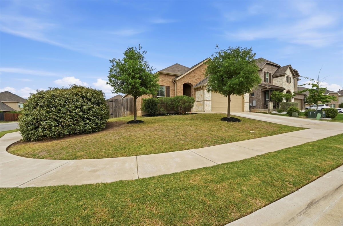 View 392 Algaroba Loop in Sunfield Ph Three Sec Three 392 Algaroba Loop - front exterior - Luxury home in Sunfield Ph Three Sec Three, Buda, TX