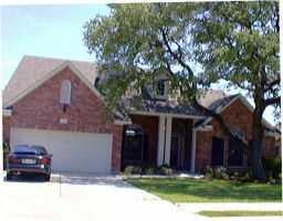 View 3957 Sendero Dr in LOST CREEK AT GAINES TRAVIS 3957 Sendero Dr - front exterior - Luxury home in LOST CREEK AT GAINES TRAVIS, Austin, TX