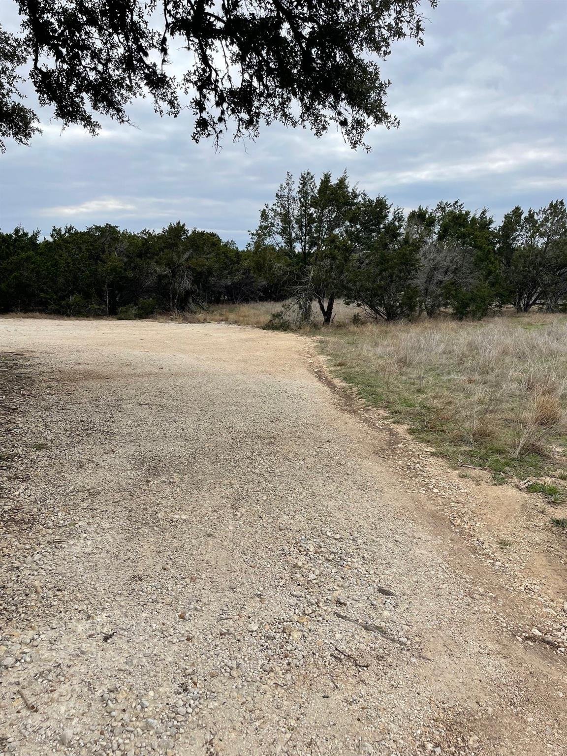 View 4 Cedar Ct in Woodcreek Sec 8 4 Cedar Ct - front exterior - Luxury lot in Woodcreek Sec 8, Wimberley, TX
