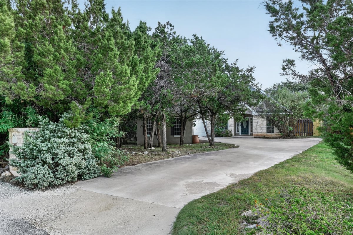 View 4 Cedarwood CIR in Woodcreek Sec 20 4 Cedarwood CIR - property photo 1 - Luxury home in Woodcreek Sec 20, Wimberley, TX