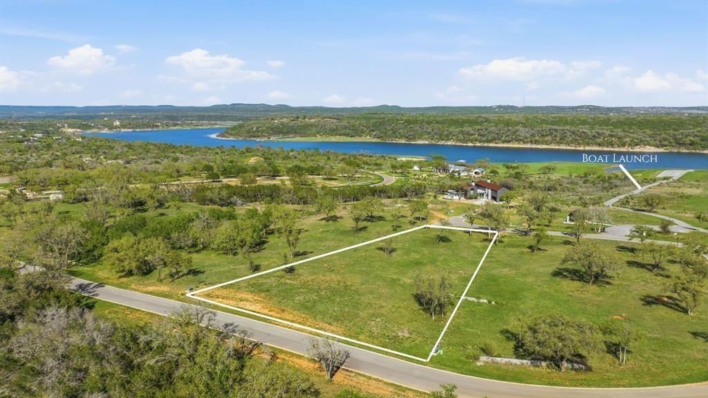 View 4 Creek Hollow WAY in THE LANDINGS AT LAKE TRAVIS 4 Creek Hollow WAY - front exterior - Luxury lot in THE LANDINGS AT LAKE TRAVIS, Spicewood, TX