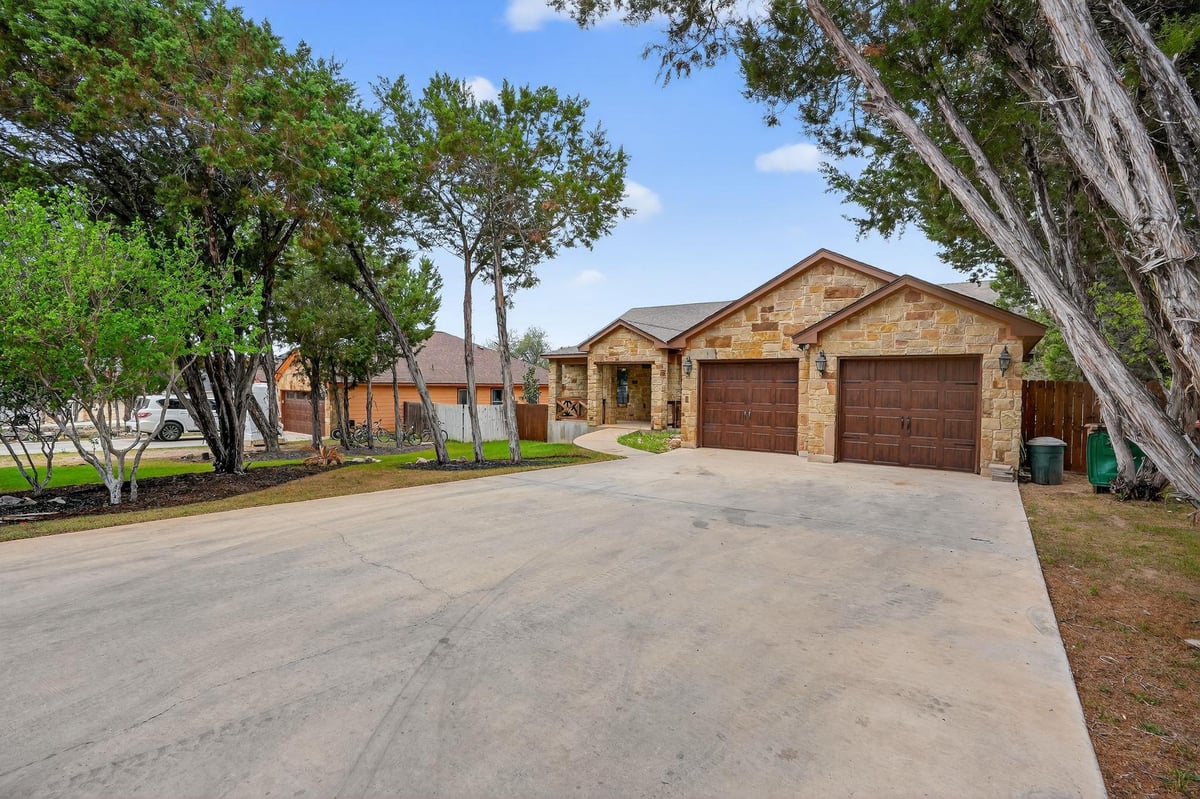 View 4 Redwood Cir in Woodcreek 4 Redwood Cir - front exterior - Luxury home in Woodcreek, Wimberley, TX