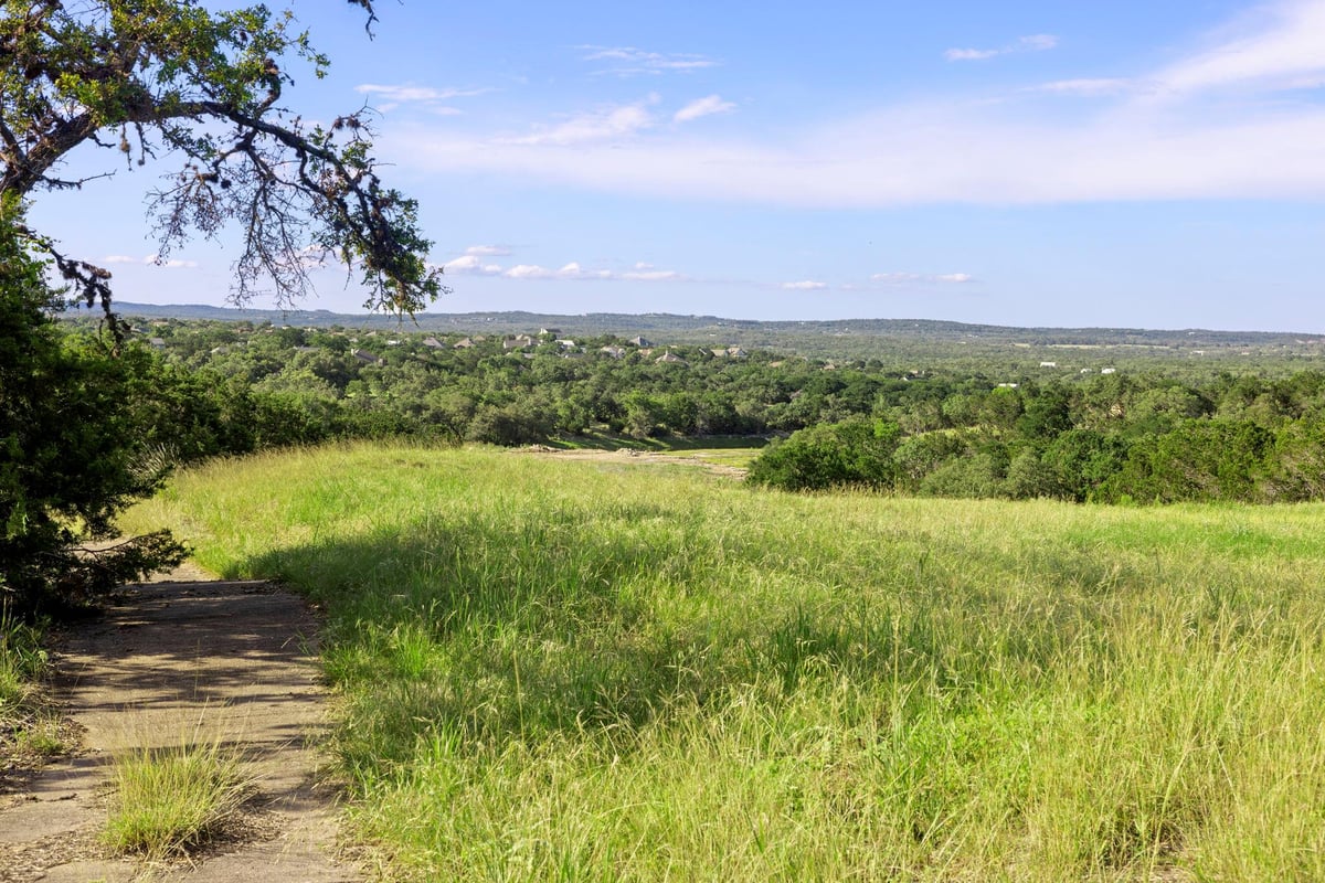View 4 Shilo CV in Woodcreek 4 Shilo CV - front exterior - Luxury lot in Woodcreek, Wimberley, TX