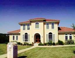 4 Torrington Ct - front exterior - Luxury home in THE HILLS OF LAKEWAY, Austin, TX