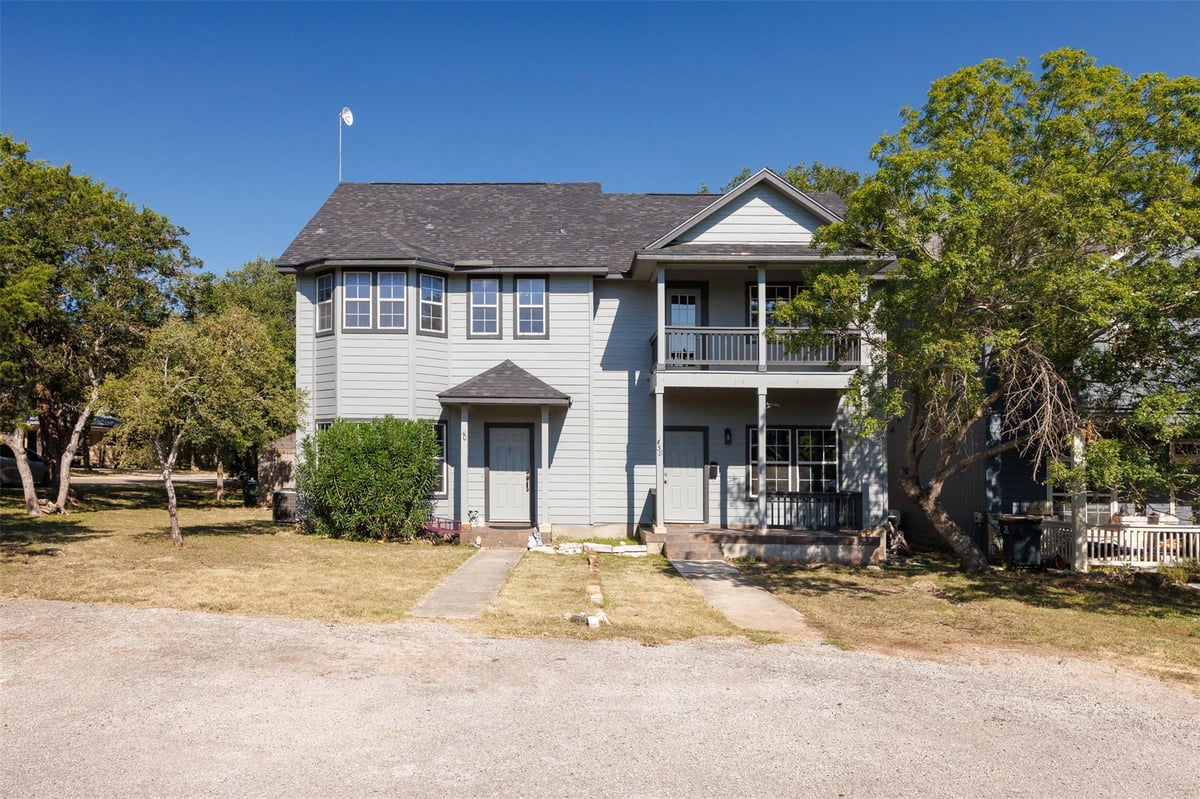View 40 Deer Ridge Rd in Woodcreek Sec 9A 40 Deer Ridge Rd - property photo 1 - Luxury home in Woodcreek Sec 9A, Wimberley, TX