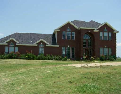 View 400 County Road 369 400 County Road 369 - front exterior - Luxury home in Taylor, TX