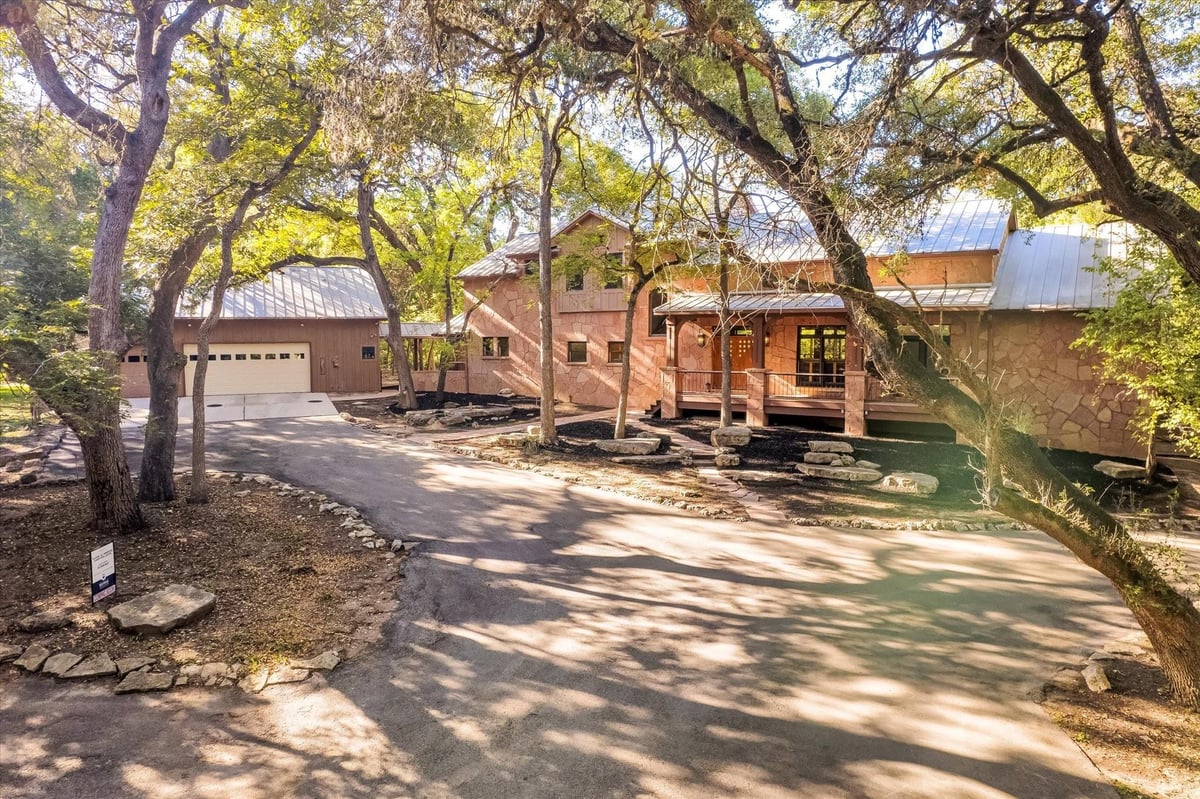 View 400 E BLANCO BEND Rd in BLANCO BEND 400 E BLANCO BEND Rd - front exterior - Luxury home in BLANCO BEND, Wimberley, TX