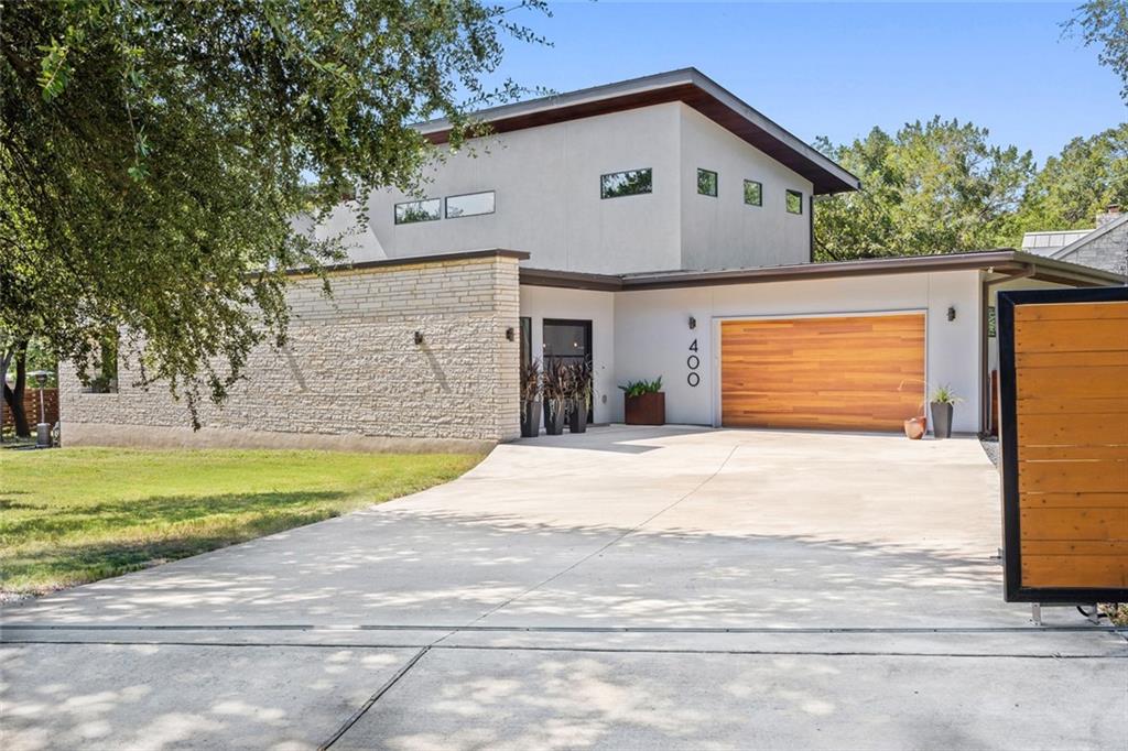View 400 Lago Verde Rd in Rio Vista Add 400 Lago Verde Rd - front exterior - Luxury home in Rio Vista Add, Austin, TX