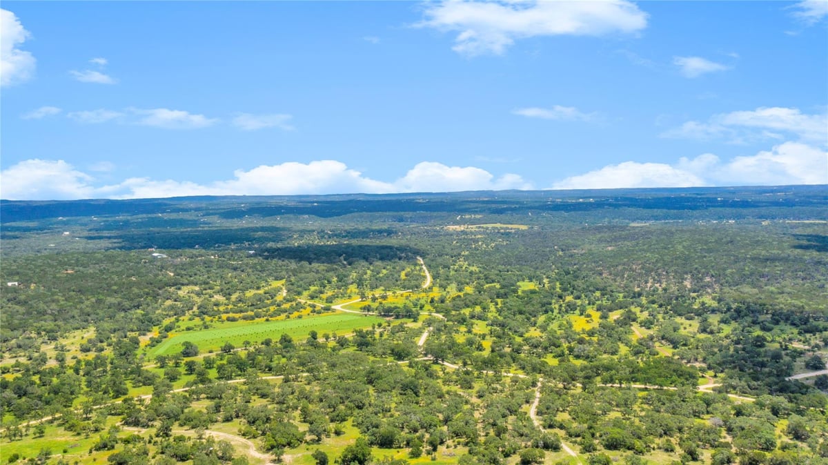 View 400 Wolf TRL in Burnett Ranch Sec 5 400 Wolf TRL - front exterior - Luxury lot in Burnett Ranch Sec 5, Wimberley, TX