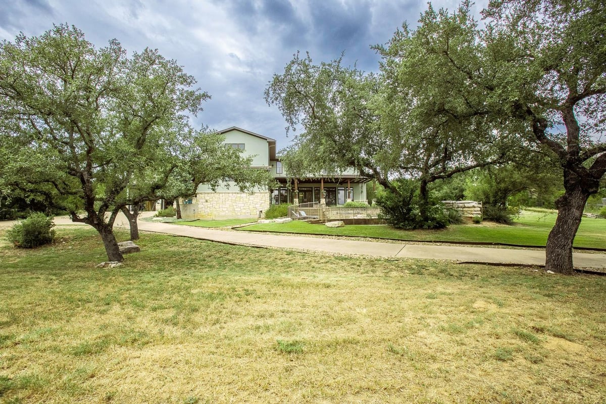 View 4004 Cloudy Ridge Rd in Windmill Bluff Estates 4004 Cloudy Ridge Rd - front exterior - Luxury home in Windmill Bluff Estates, Austin, TX
