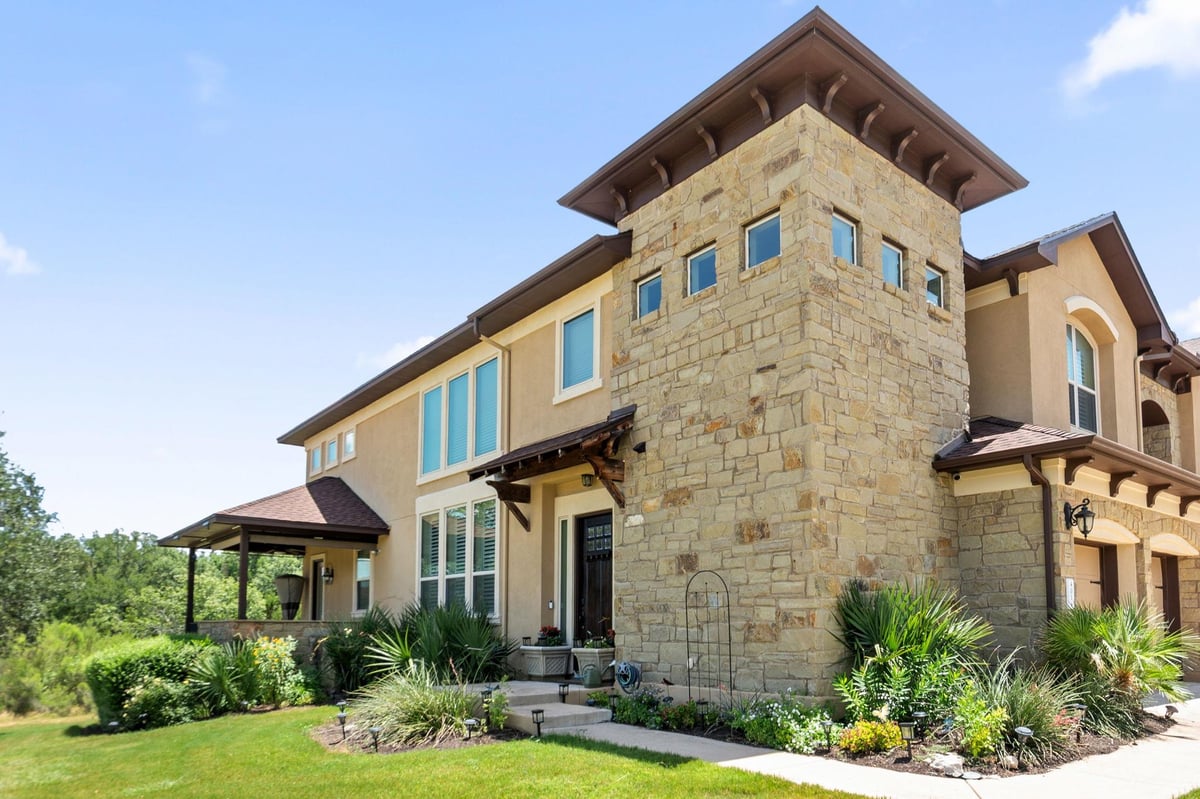 View 401 Bellagio DR in Pinnacle at North Lakeway 401 Bellagio DR - front exterior - Luxury home in Pinnacle at North Lakeway, Lakeway, TX