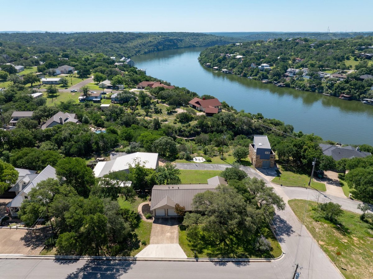 View 401 Crestview DR in Rippy-Baker Sub 401 Crestview DR - front exterior - Luxury home in Rippy-Baker Sub, Marble Falls, TX