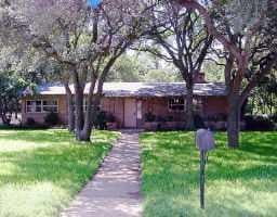 View 402 Riley Rd in ROLLINGWOOD 402 Riley Rd - front exterior - Luxury home in ROLLINGWOOD, Austin, TX
