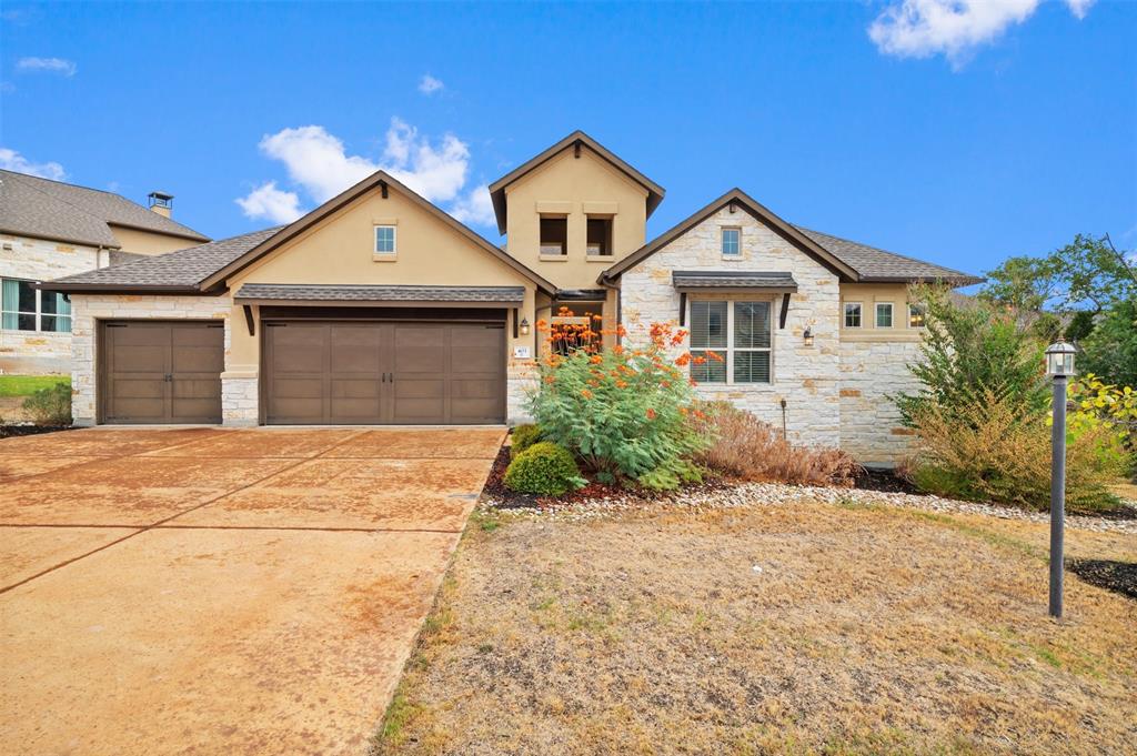 View 403 Baldovino Skwy in Rough Hollow - Lakeway Highlands PH2 Sec 1B 403 Baldovino Skwy - front exterior - Luxury home in Rough Hollow - Lakeway Highlands PH2 Sec 1B, Austin, TX