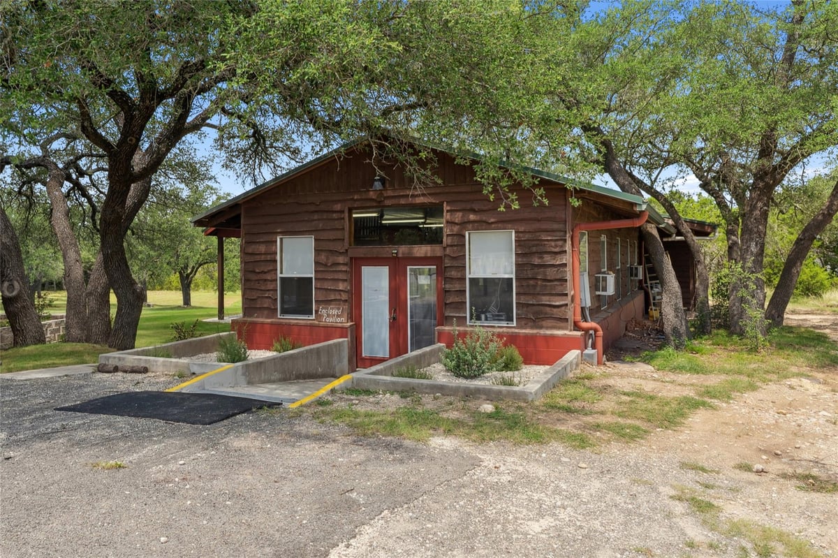 Primary bedroom at 4032 Ranch Road 3232 - Johnson City, TX