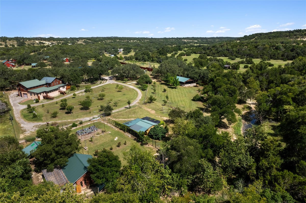 View 4032 Ranch Road 3232 in none 4032 Ranch Road 3232 - aerial view with 4032 Ranch Road 3232 in Johnson City - Luxury home in none, Johnson City, TX