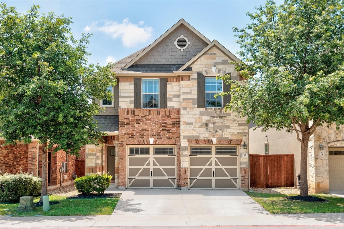 View 404 Buttercup Creek BLVD Unit #20 in Buttercup Villas 404 Buttercup Creek BLVD Unit #20 - front exterior - Luxury home in Buttercup Villas, Cedar Park, TX