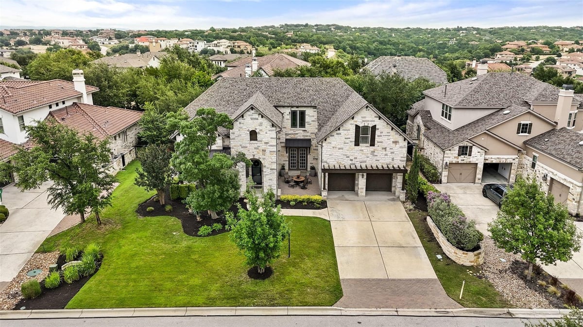 View 404 Woodside TER in Lakeway Highlands Ph 1 Sec 7B 404 Woodside TER - front exterior - Luxury home in Lakeway Highlands Ph 1 Sec 7B, Austin, TX
