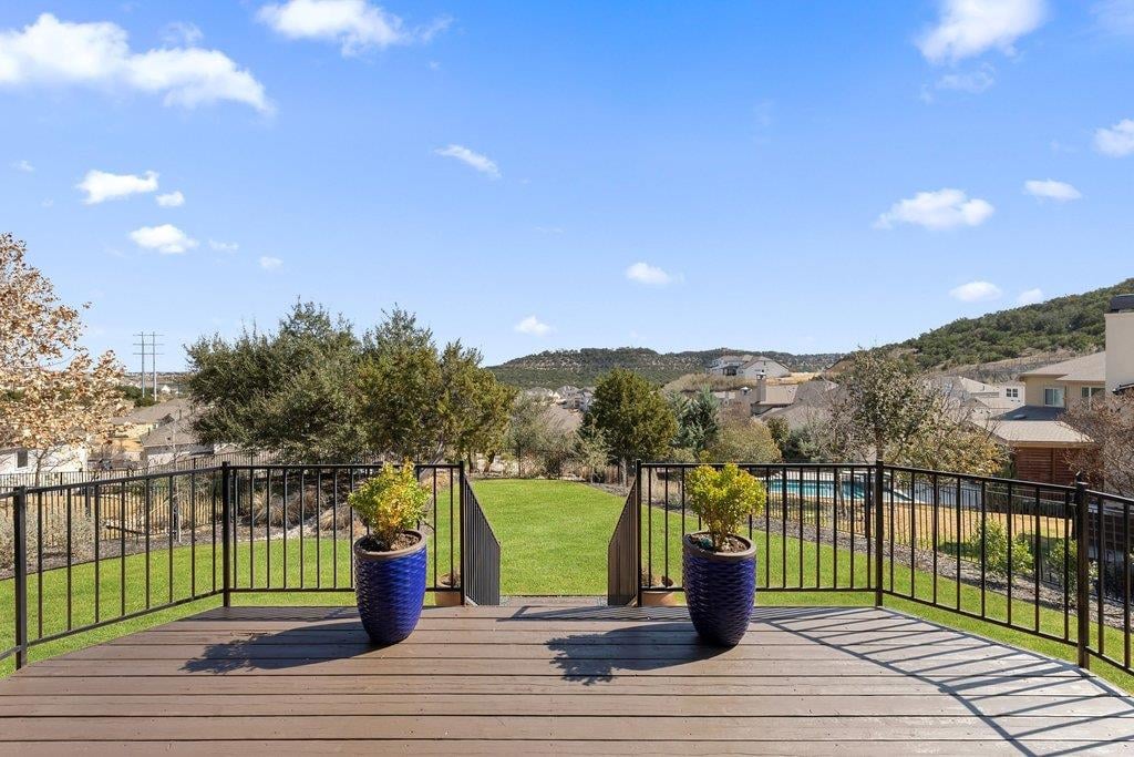 View 405 Baldovino Skwy in Lakeway Highlands Ph 2 Sec 1B 405 Baldovino Skwy - front exterior - Luxury home in Lakeway Highlands Ph 2 Sec 1B, Lakeway, TX