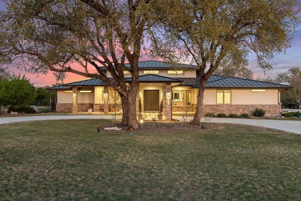 View 405 Spicewood Trails Dr in Spicewood Trails 405 Spicewood Trails Dr - front exterior - Luxury home in Spicewood Trails, Spicewood, TX