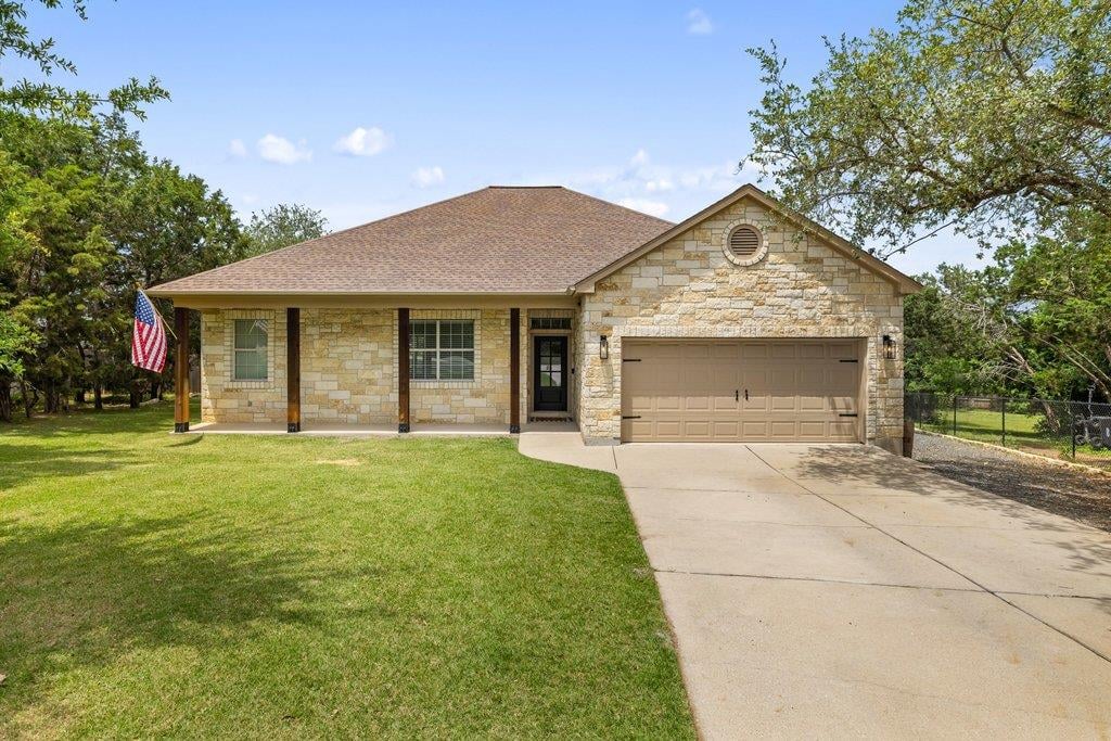 View 406 Strichen Dr in Briarcliff Inc Sec 15 406 Strichen Dr - front exterior - Luxury home in Briarcliff Inc Sec 15, Spicewood, TX