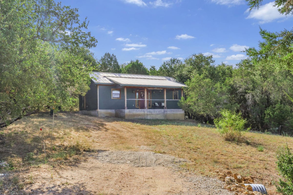 View 407 Breezing LN in Lakeside Beach 407 Breezing LN - property photo 1 - Luxury home in Lakeside Beach, Spicewood, TX