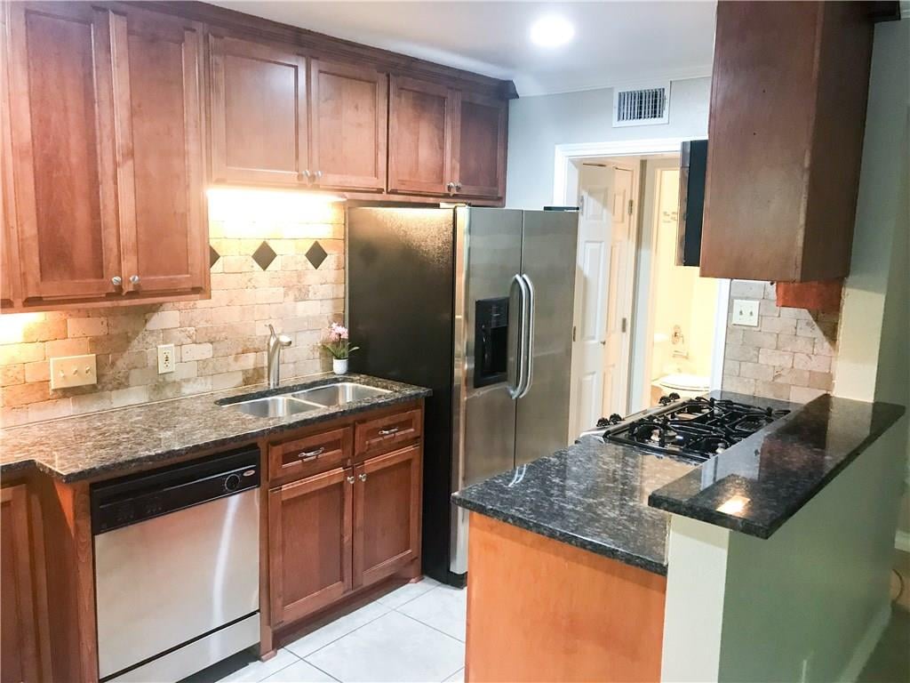 View 407 E 45th St Unit #110 in Spanish Oaks Condo Amd 407 E 45th St Unit #110 - front exterior - Luxury home in Spanish Oaks Condo Amd, Austin, TX