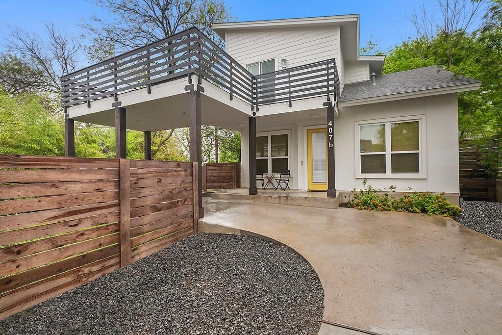 View 407 Post Road DR Unit #B in Post Road Drive Condominiums 407 Post Road DR Unit #B - front exterior - Luxury home in Post Road Drive Condominiums, Austin, TX