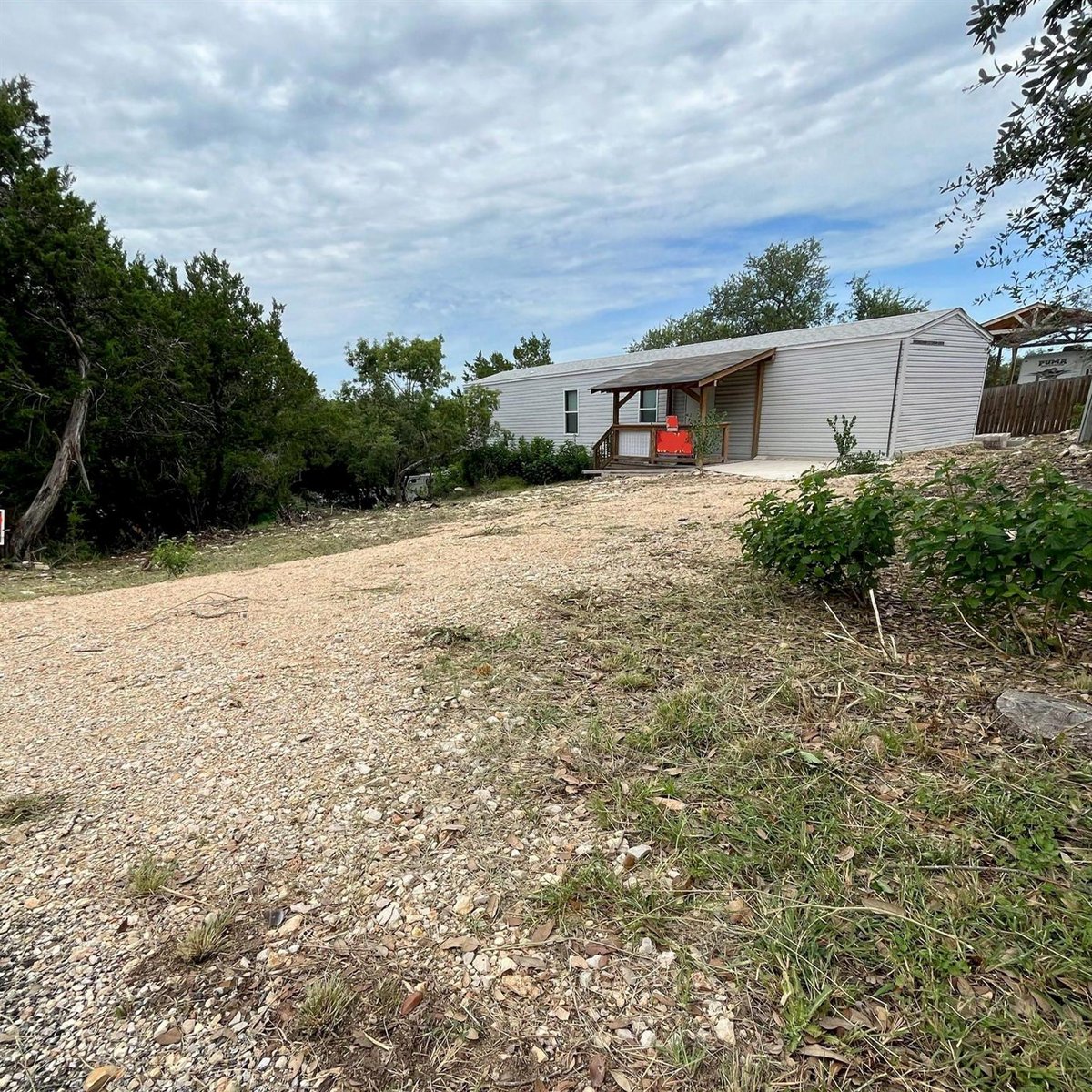 View 407 Rockport Dr in Lake View Park 407 Rockport Dr - front exterior - Luxury lot in Lake View Park, Canyon Lake, TX