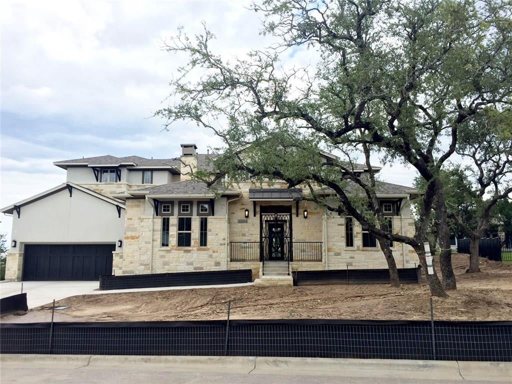 View 408 Woodside TER in Lakeway Highlands Ph 1 Sec 7b 408 Woodside TER - front exterior - Luxury home in Lakeway Highlands Ph 1 Sec 7b, Austin, TX