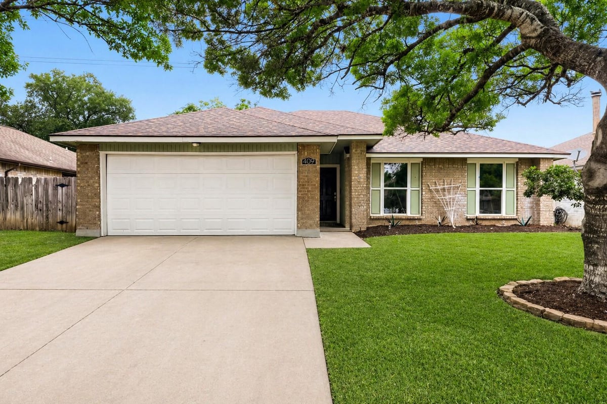 View 409 Kathleen Ln in Block House Creek 409 Kathleen Ln - front exterior - Luxury home in Block House Creek, Leander, TX