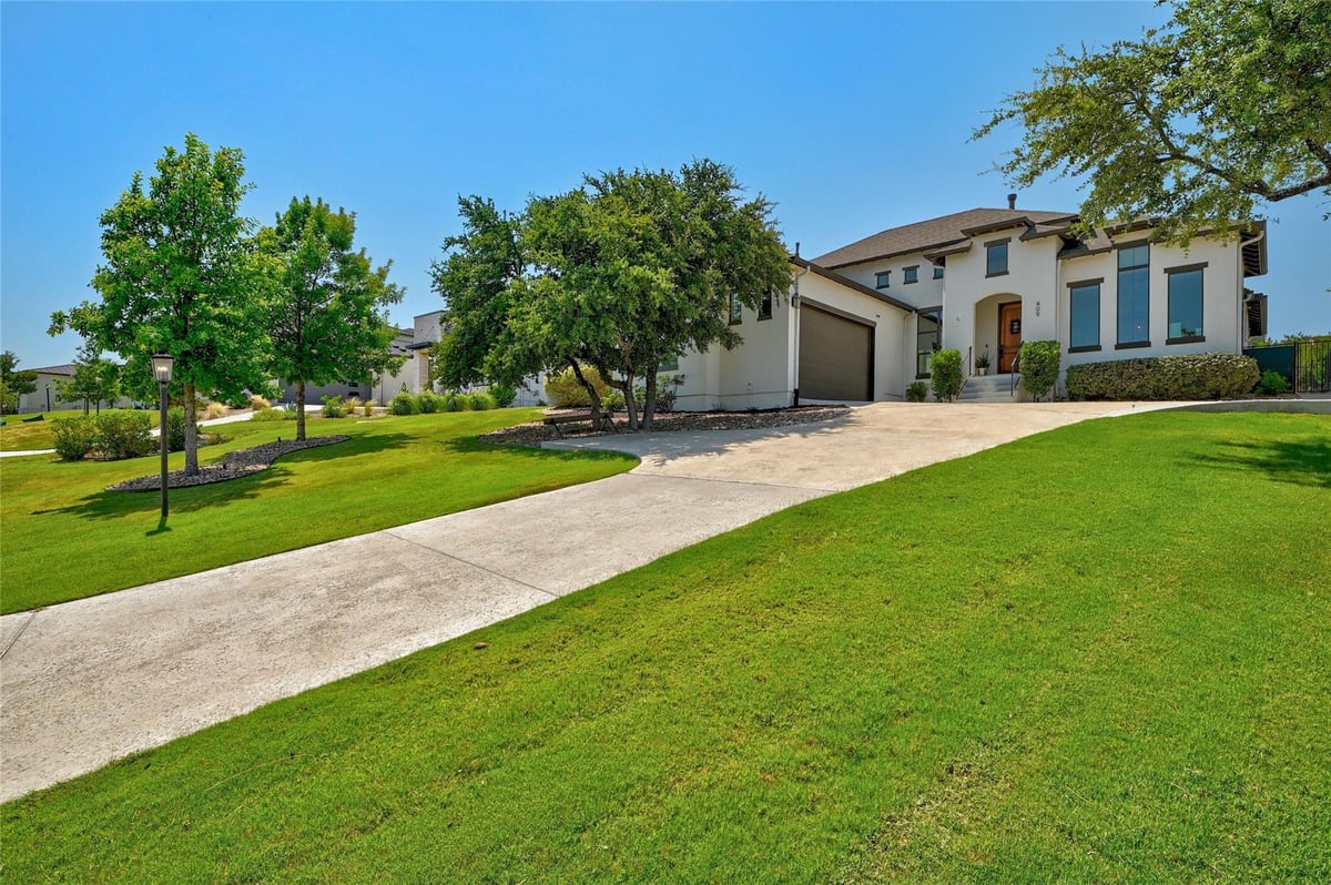 View 409 Ringtail Stream Dr in Serene Hills 409 Ringtail Stream Dr - front exterior - Luxury home in Serene Hills, Austin, TX