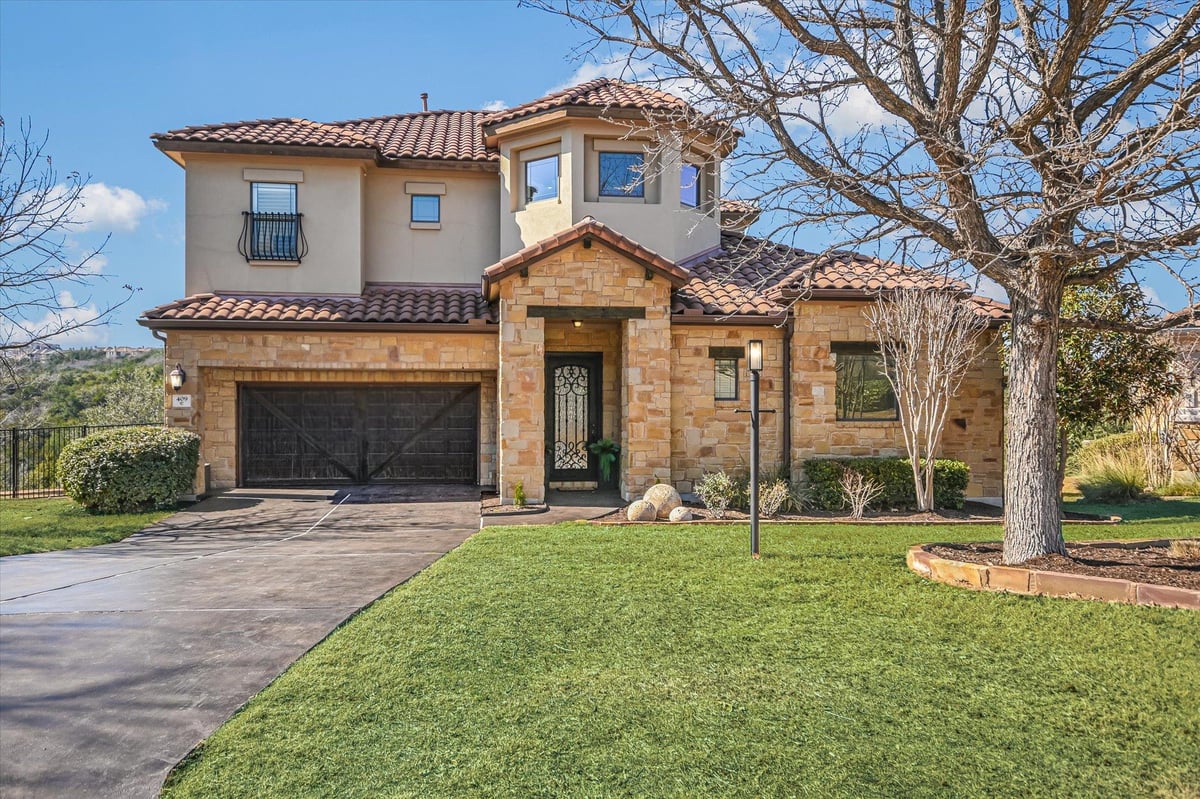 409 Rocky Coast Dr - front exterior - Luxury home in Rough Hollow Sec 5A, Austin, TX