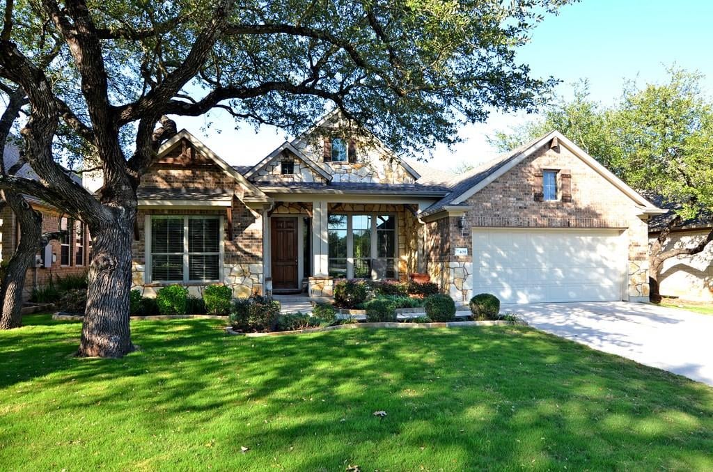 View 409 Wild Rose Dr in Highpointe 409 Wild Rose Dr - front exterior - Luxury home in Highpointe, Austin, TX