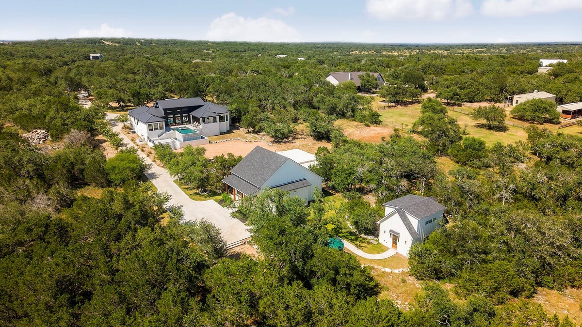 View 410 Canyon Gap RD in Saddleridge Sec 2 410 Canyon Gap RD - property photo 1 - Luxury home in Saddleridge Sec 2, Wimberley, TX