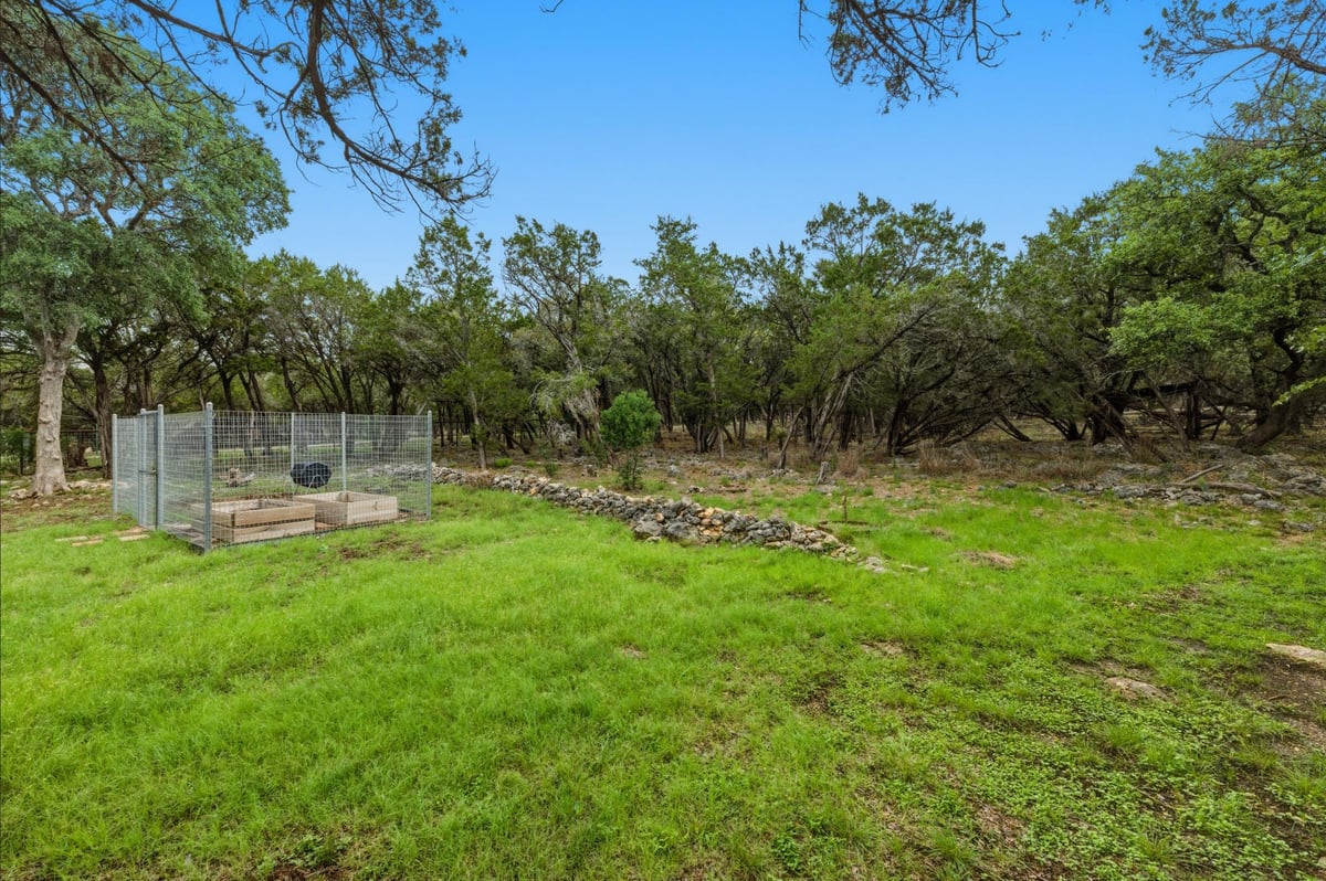 Primary bedroom at 410 Cedar Bend Rd - Burnett Ranch Sec 2, Wimberley, TX