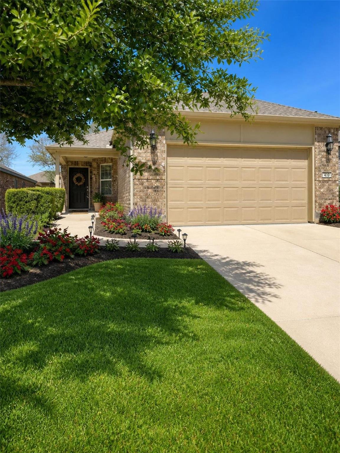 View 410 Holiday Creek LN in Sun City 410 Holiday Creek LN - front exterior - Luxury home in Sun City, Georgetown, TX