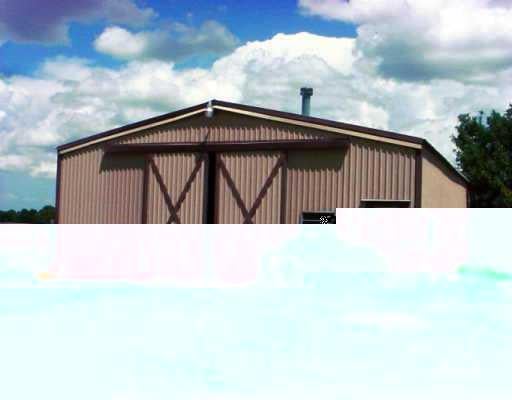 View 4100 Co Rd 327 4100 Co Rd 327 - front exterior - Luxury home in Granger, TX