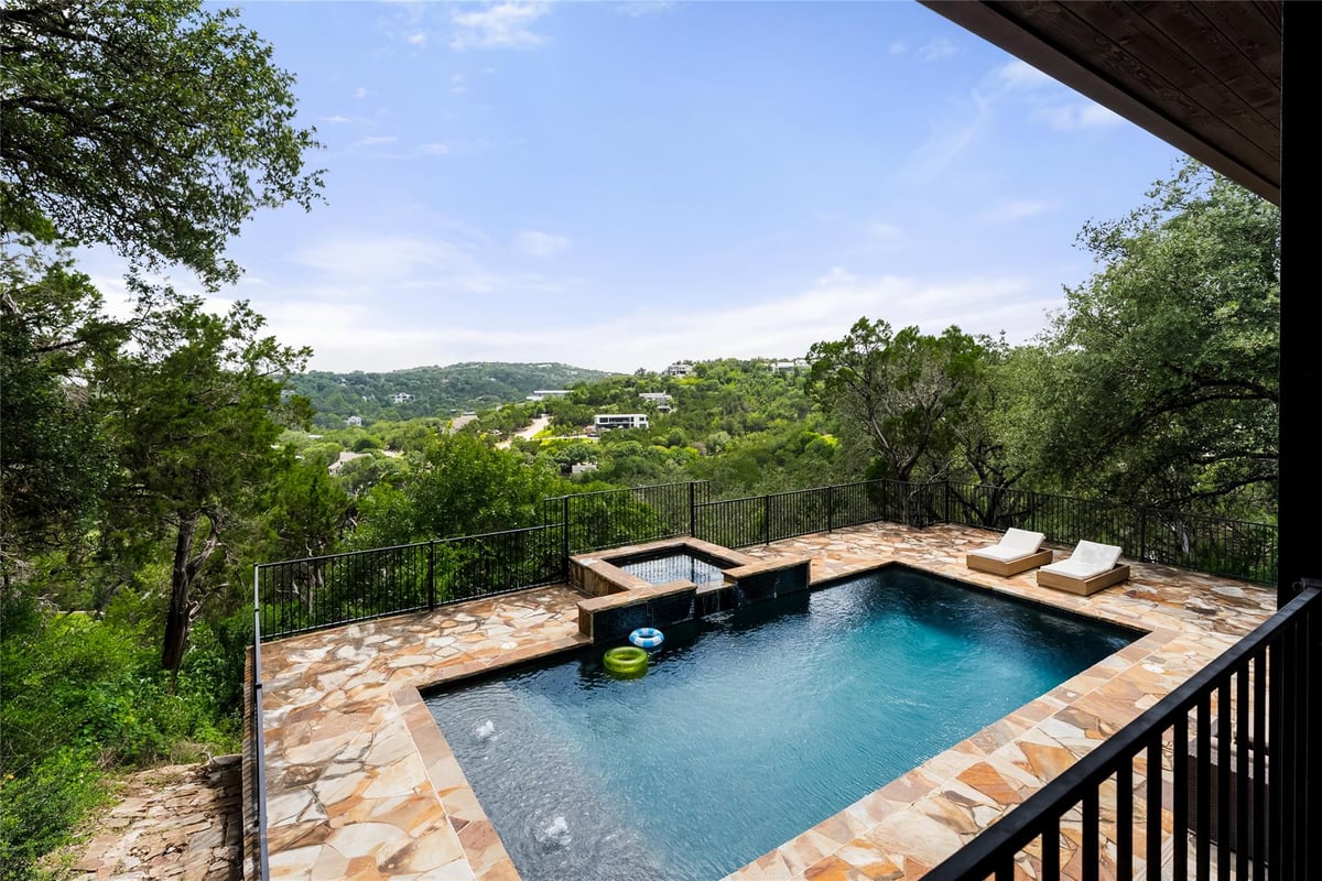 View 411 Skyline Dr in Skyline Terrace Sec 01 411 Skyline Dr - front exterior - Luxury home in Skyline Terrace Sec 01, West Lake Hills, TX