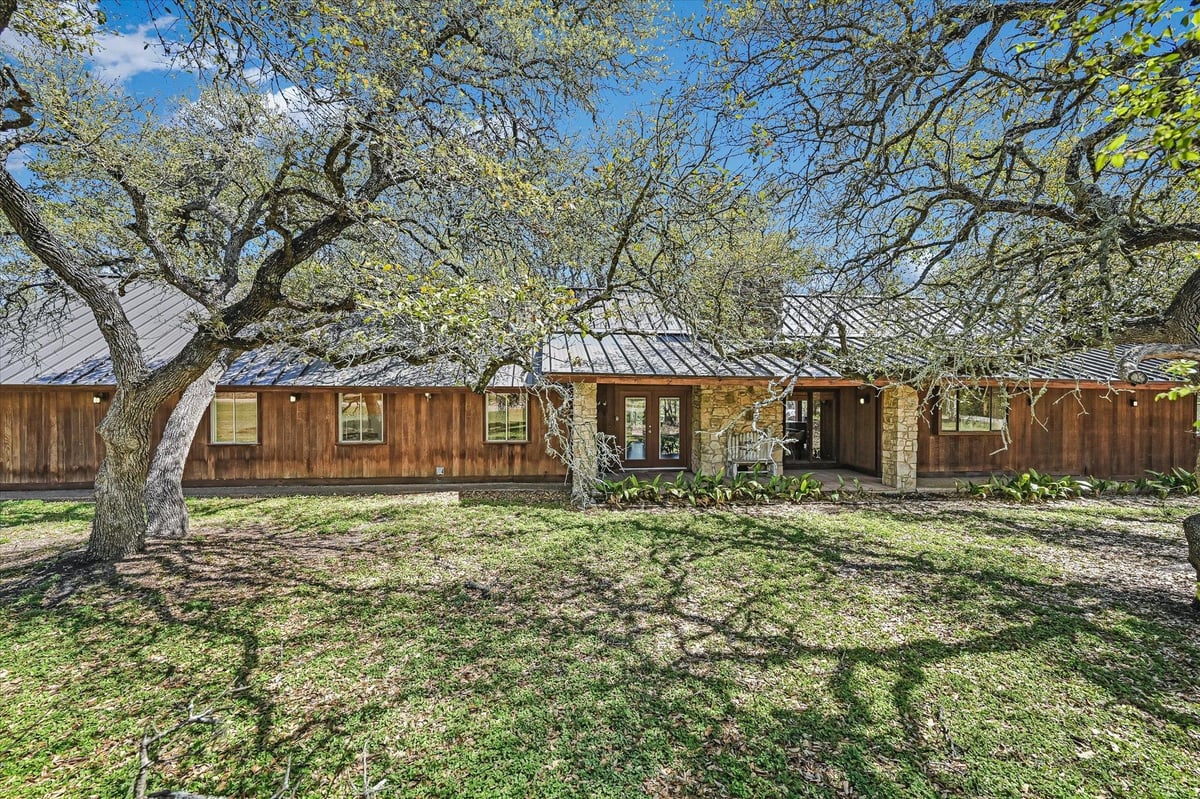 View 411 Whitetail Ridge Rd in Whitetail Ranch 411 Whitetail Ridge Rd - front exterior - Luxury home in Whitetail Ranch, Dripping Springs, TX