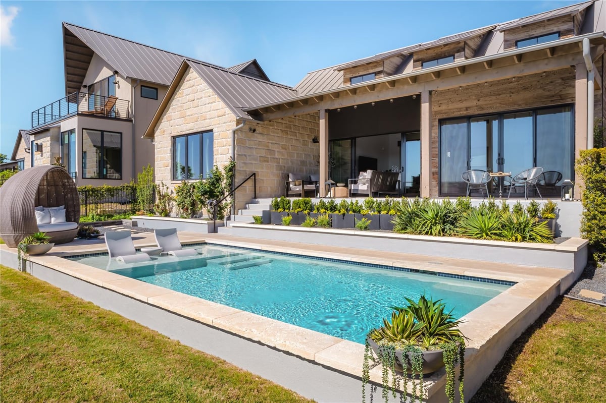 View 412 Kayak Way in Westside Landing / Rough Hollow 412 Kayak Way - front exterior - Luxury home in Westside Landing / Rough Hollow, Lakeway, TX