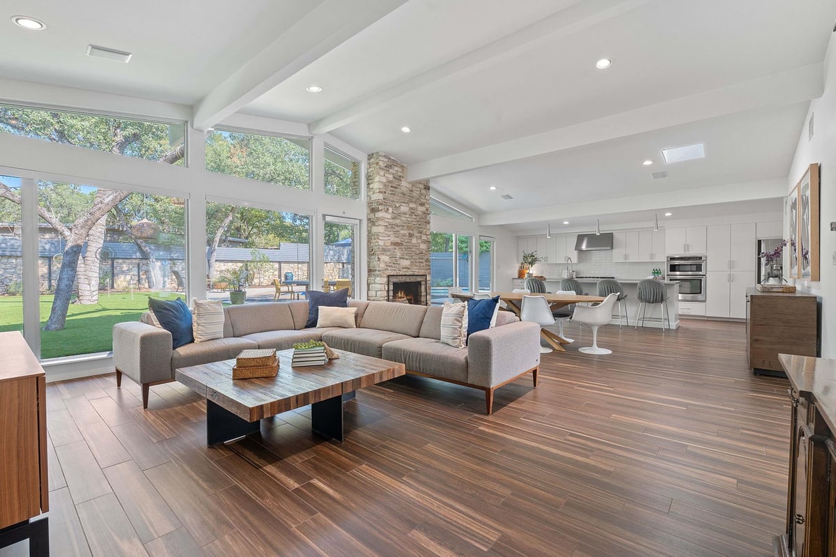 View 412 Ridgewood Rd in Ridgewood Village Sec 02 412 Ridgewood Rd - living area with open living area and stone fireplace - Luxury home in Ridgewood Village Sec 02, West L...