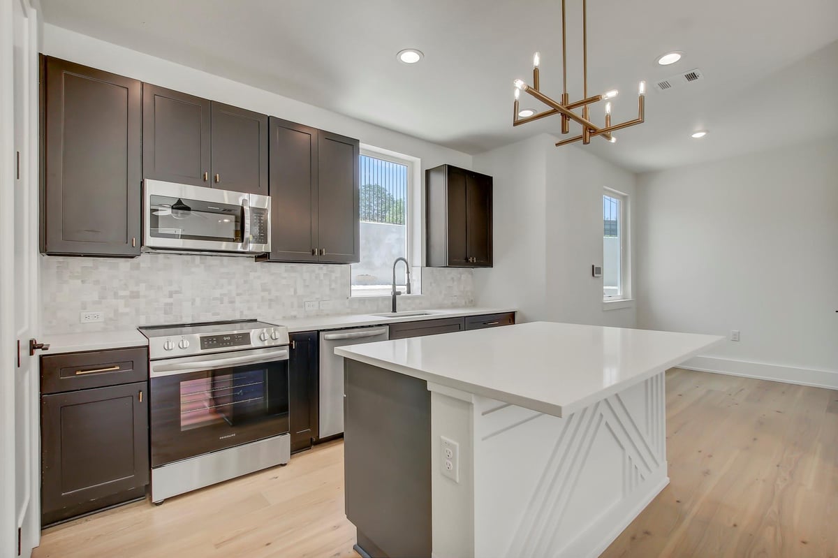 Living area at 4127 E 12th St Unit #8 - 3 bed 2 bath home