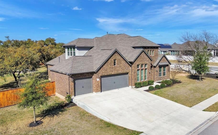 View 414 Painted Creek Way in 6 Creeks Ph 1 Sec 3 414 Painted Creek Way - front exterior - Luxury home in 6 Creeks Ph 1 Sec 3, Kyle, TX