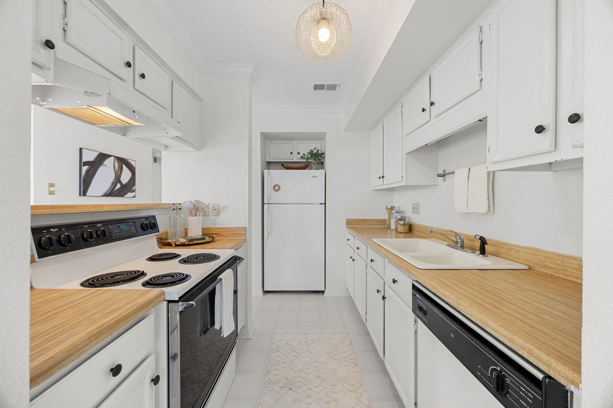 Kitchen at 4159 Steck Ave Unit #258 - 2 bed 2 bath home