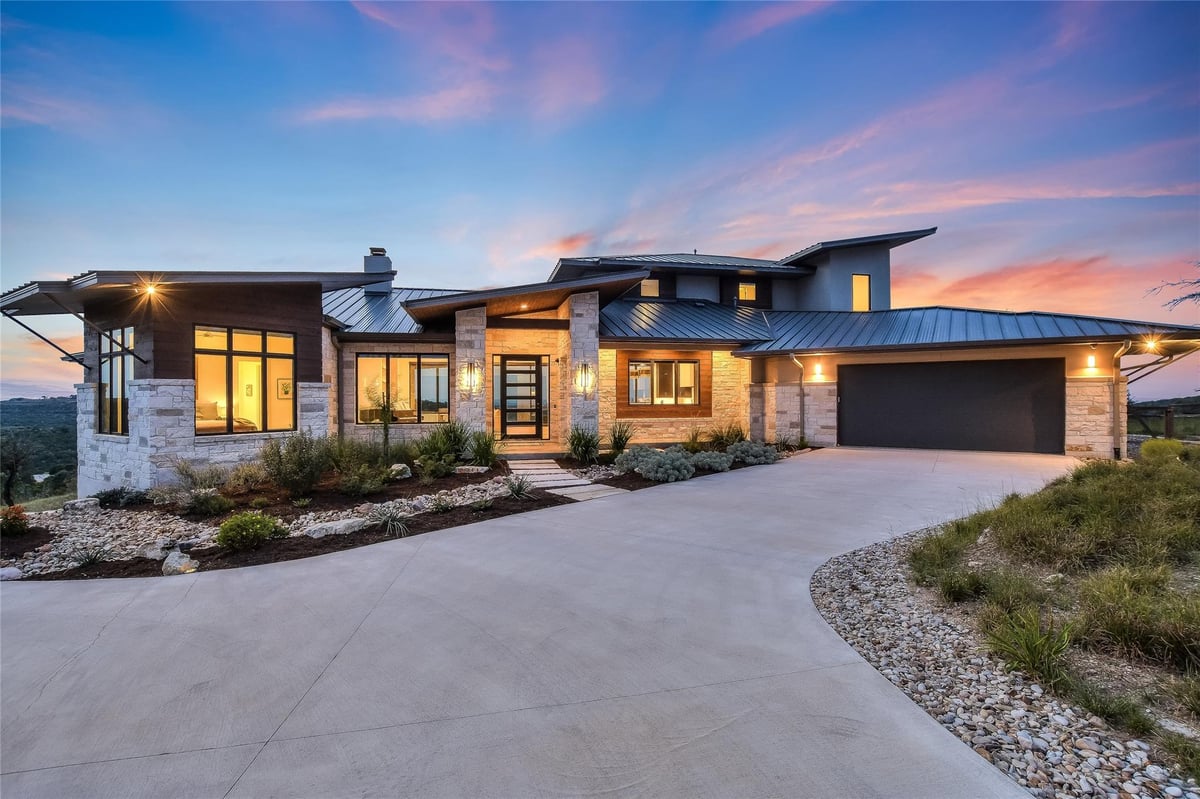 View 416 Julieanne Cv in Estates of Walking W Ranch 416 Julieanne Cv - front exterior with 416 Julieanne Cv in Dripping Springs - Luxury home in Estates of Walking W Ranch, D...