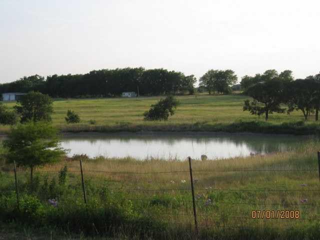 View 4170 County Rd 405 4170 County Rd 405 - front exterior - Luxury home in Taylor, TX